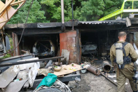В Каменском из-за пожара в гараже сгорели две машины В Каменском из-за пожара в гараже сгорели две машины