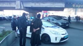 В Днепре полиция гналась за священником с георгиевской лентой